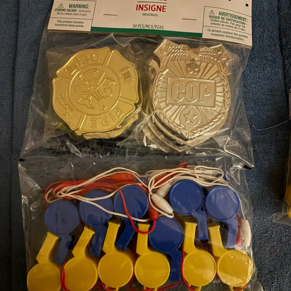 Party City Silver Badges and Blue Yellow Whistles Set